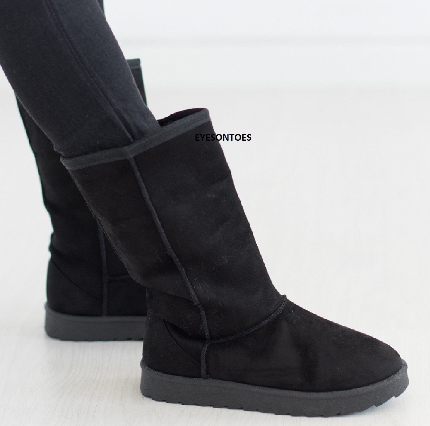 black calf hugging boots